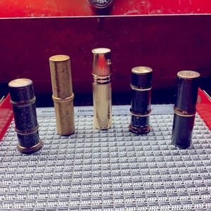Vintage brass lipstick dispensers